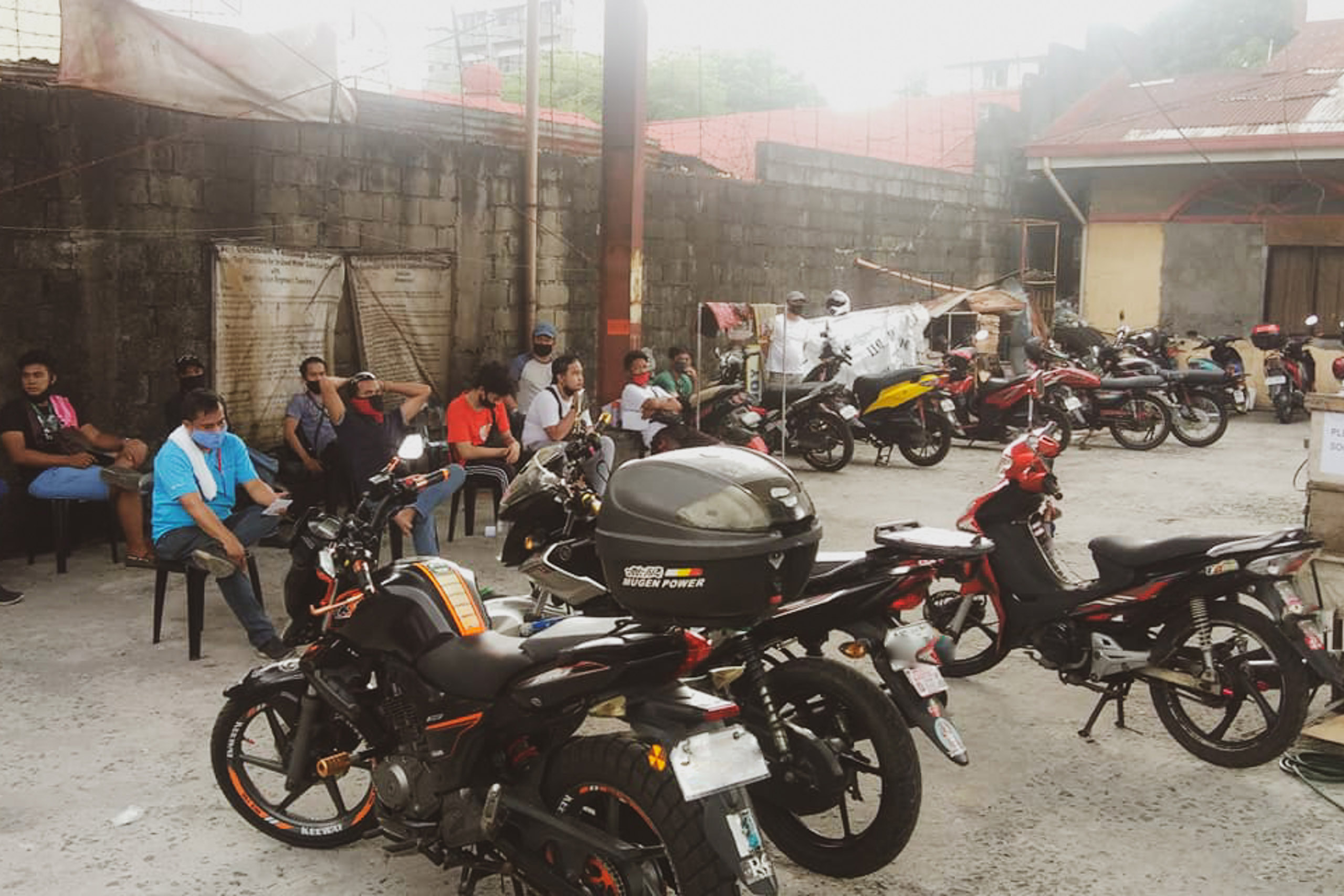 Riders line up for emission testing as early as 12 midnight
